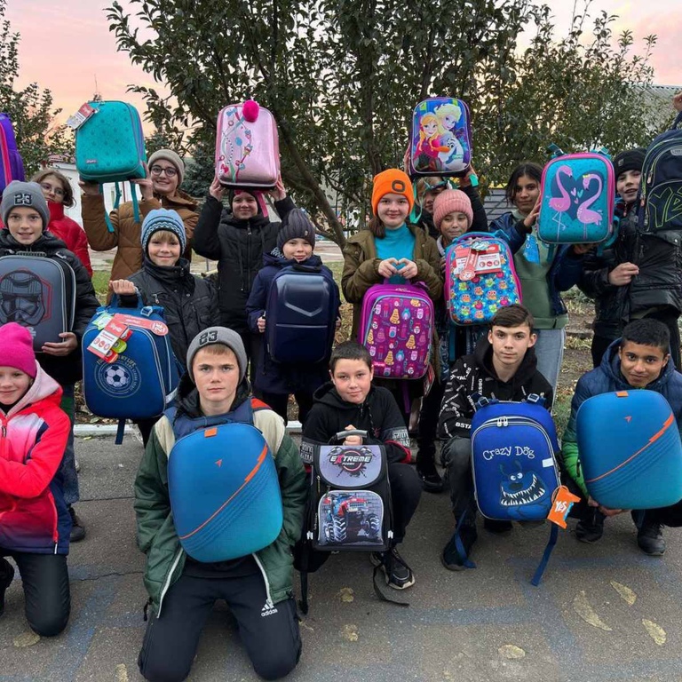 Lilia Podkopayeva with children supported by Health of Generations.